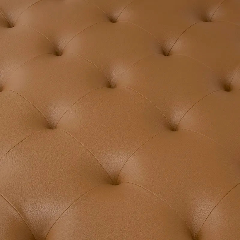 Grand pouf de cocktail en métal et cuir capitonné