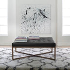 Grand pouf de cocktail en métal et cuir capitonné